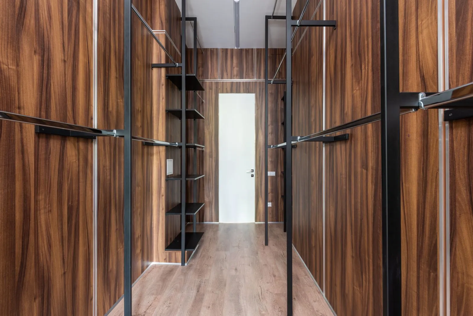 Walk-in robe in solid oak with custom shelving and drawers