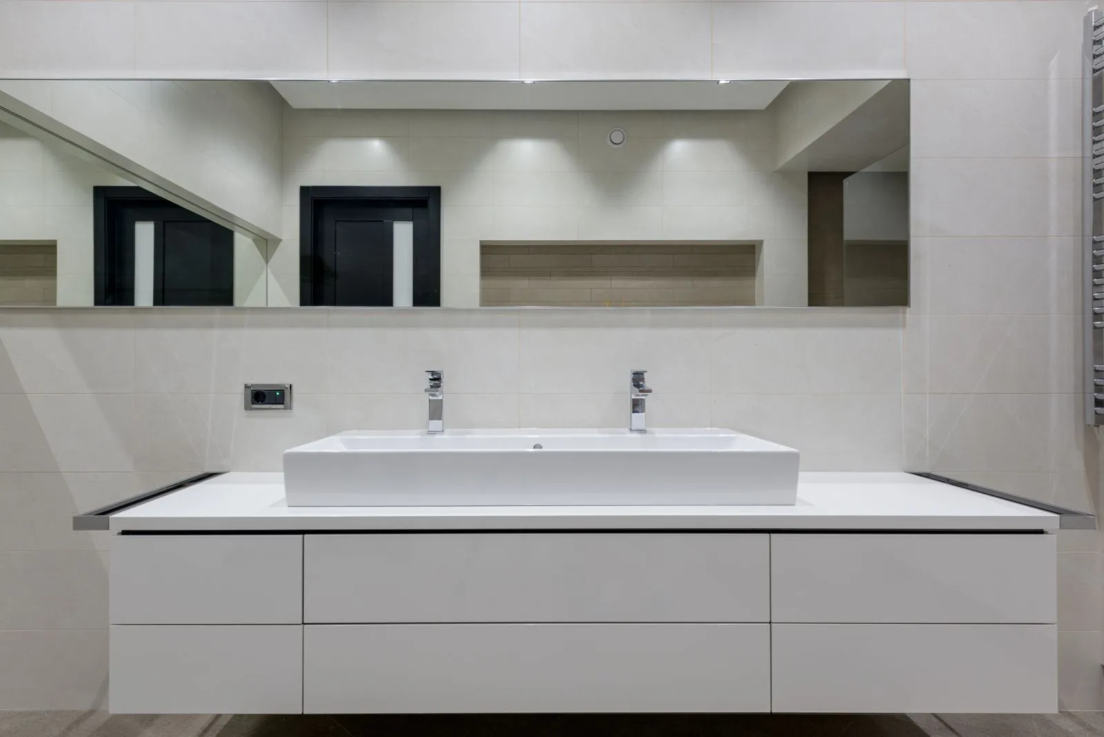 Renovated ensuite with a floating vanity and chrome tapware