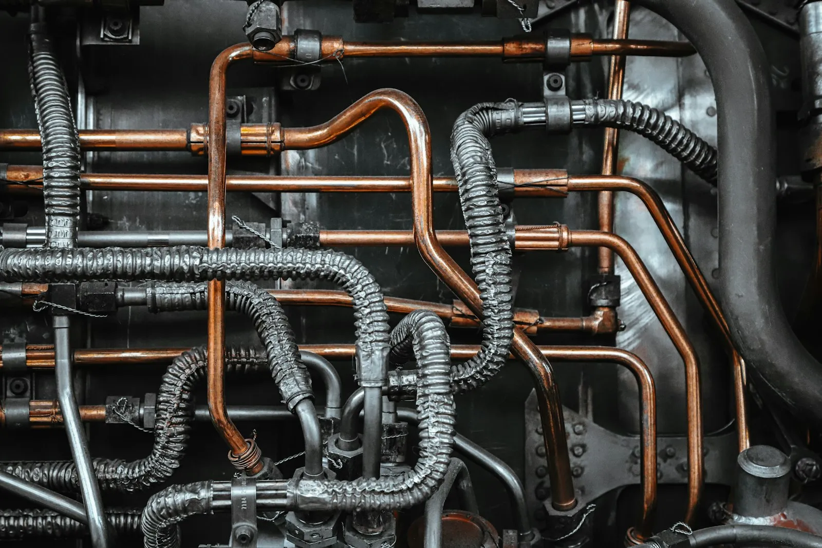 Copper pipework repaired and re-soldered under a sink